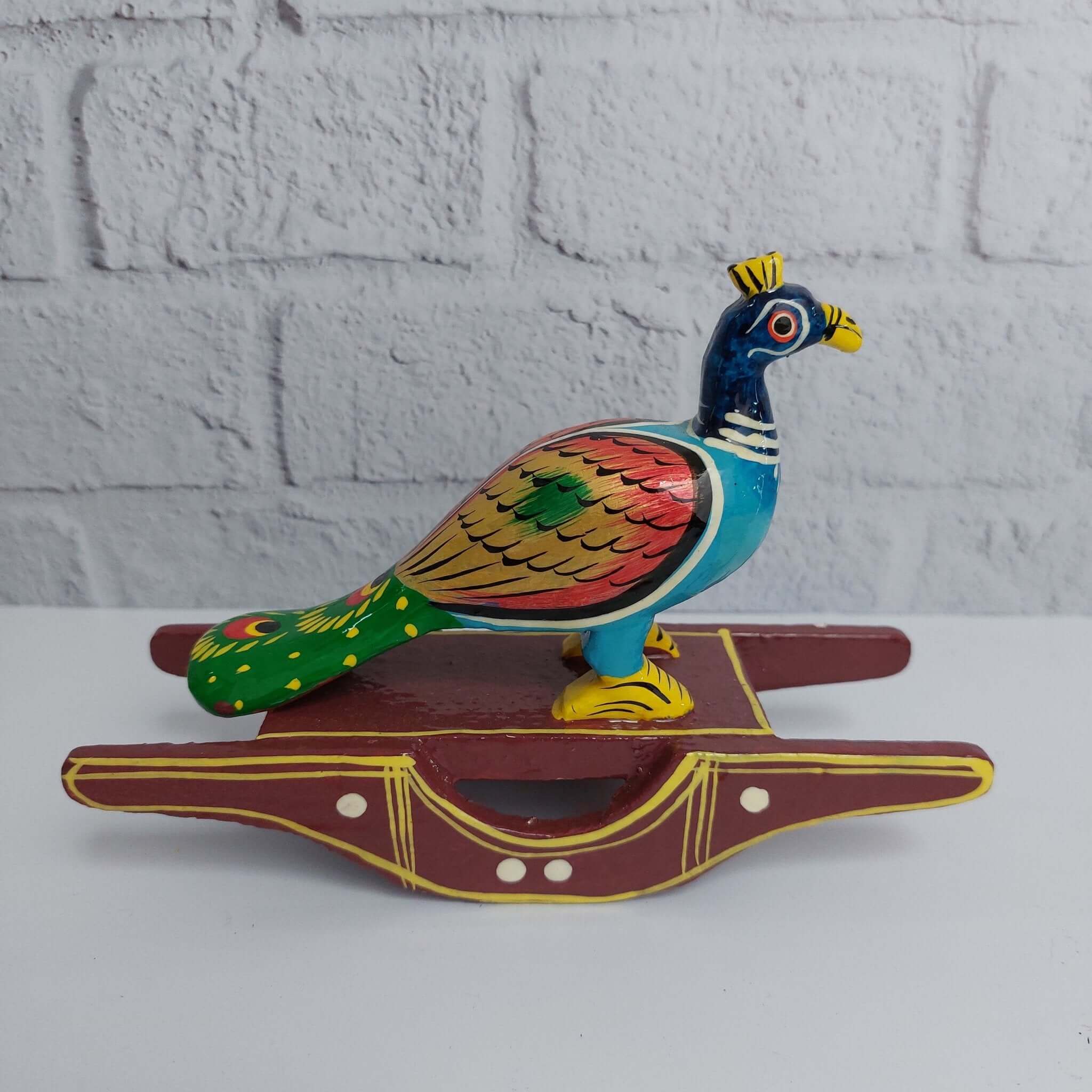 Seesaw Peacock